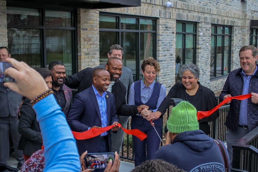 The rope cutting at The Corliss grand opening